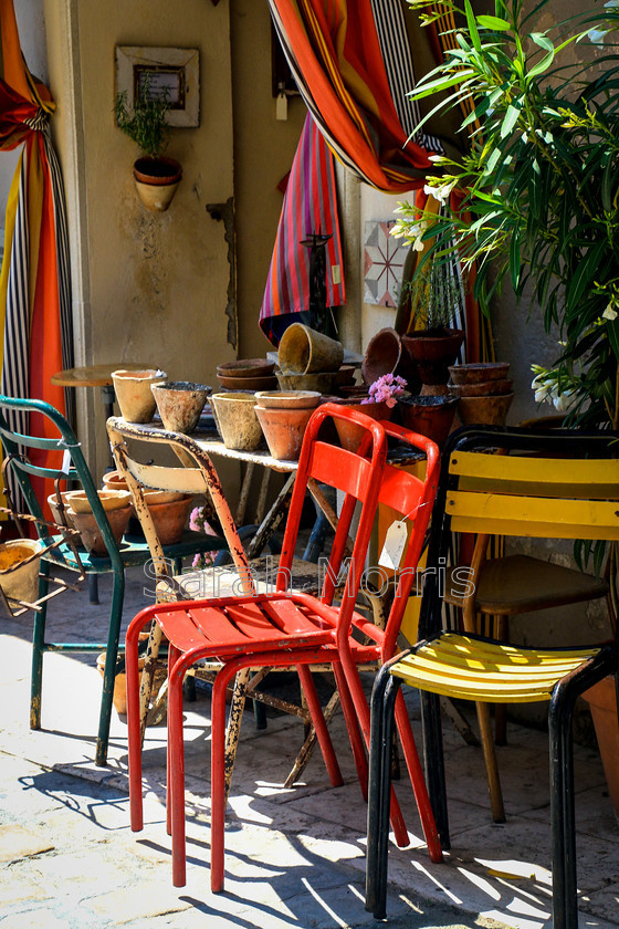 Cafe Chairs 
 Colourful chairs outside quaint cafe in Provence 
 Keywords: Chair, chairs, colour, colourful, quaint, cafe, Provence, France