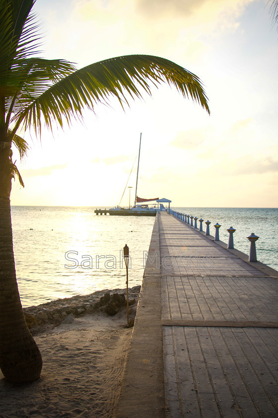 Sunset-at-Rum-Point 
 Sunset at Rum Point, Grand Cayman - view of jetty and catamaran 
 Keywords: Sunset, Rum Point, Grand Cayman, jetty, catamaran, romantic, tranquil